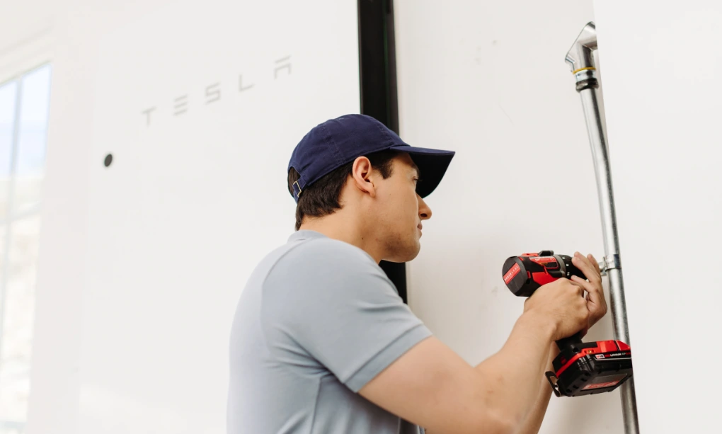 Professional installing a solar and battery system