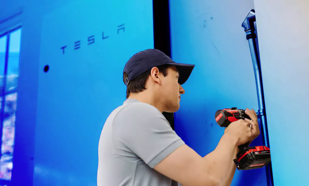Professional installing a solar and battery system